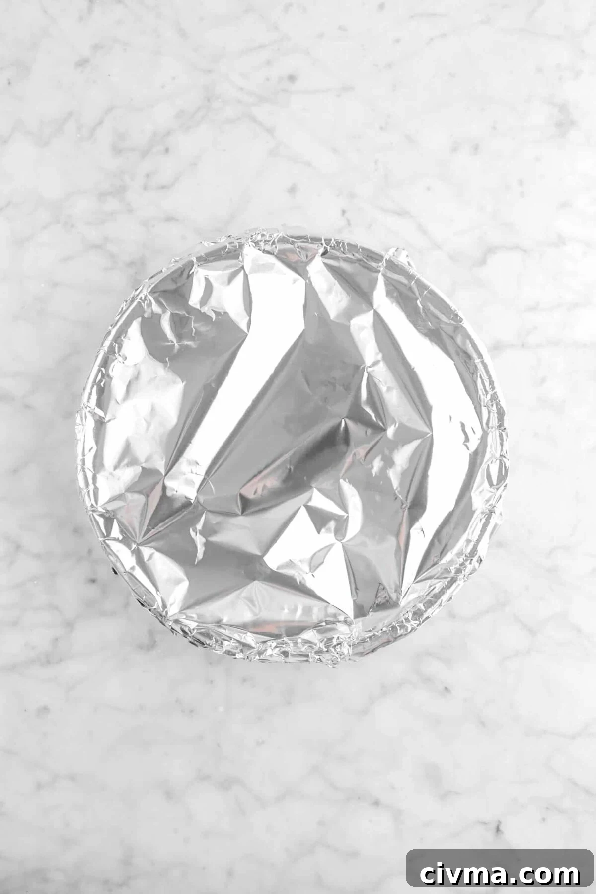 cheesecake covered with foil