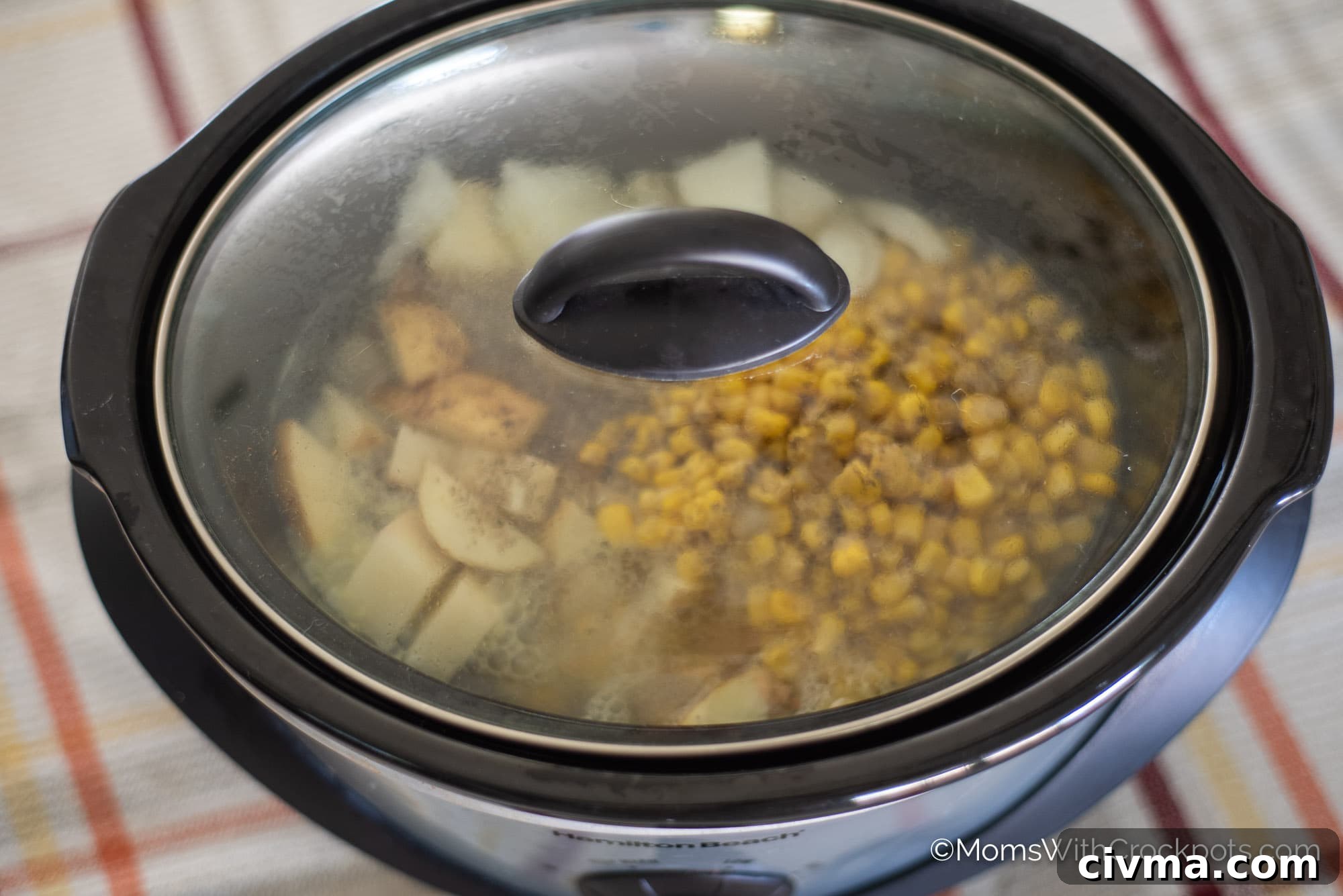 Potatoes and corn in slow cooker
