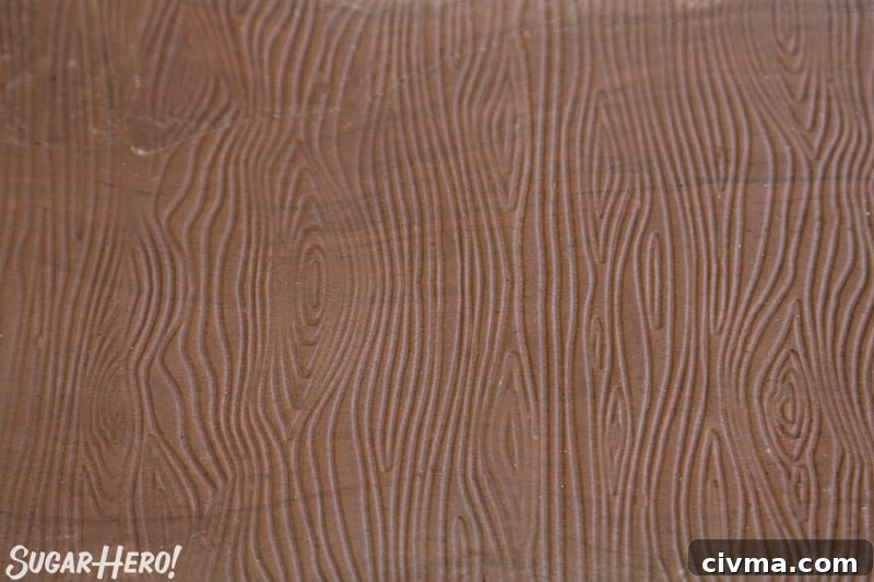 Close-up of brown fondant with wood grain texture