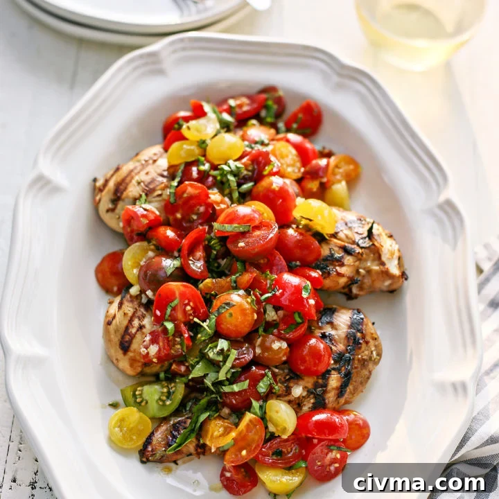 bruschetta chicken on a white platter