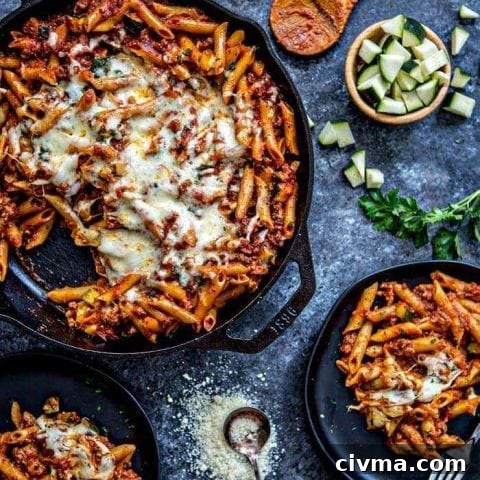 Easy One Skillet Baked Ziti is the perfect, easy comforting pasta dish. Baked Ziti made in a single skillet for a quick weeknight meal.