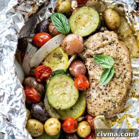 Image for Pesto Pork Chop and Summer Vegetable Foil Dinners