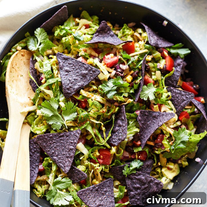 Overhead view of a veggie taco salad in a bowl