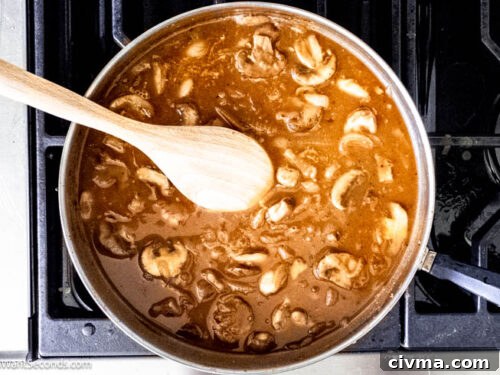 Step 7 how to make salisbury steak sauce, Make the gravy. Stir in the tomato paste, and sprinkle it with flour. Stir in the beef broth, dissolved bouillon, and sherry. Simmer.