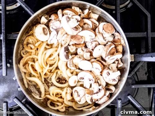 Step 6 how to make salisbury steak with onion gravy, Cook the onions and add the mushrooms.
