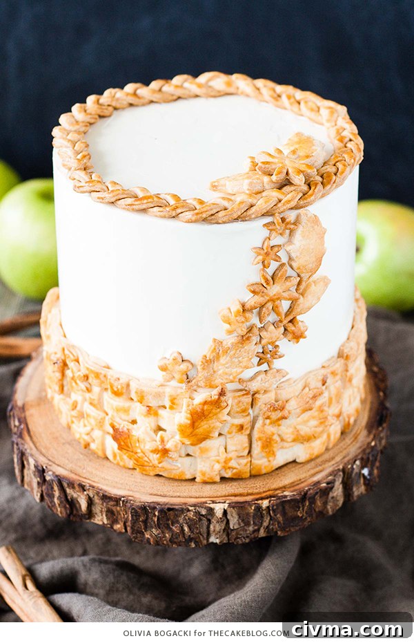 Apple Pie Cake with cinnamon, nutmeg, fresh apple pie filling, buttercream frosting, and braided pie crust lattice
