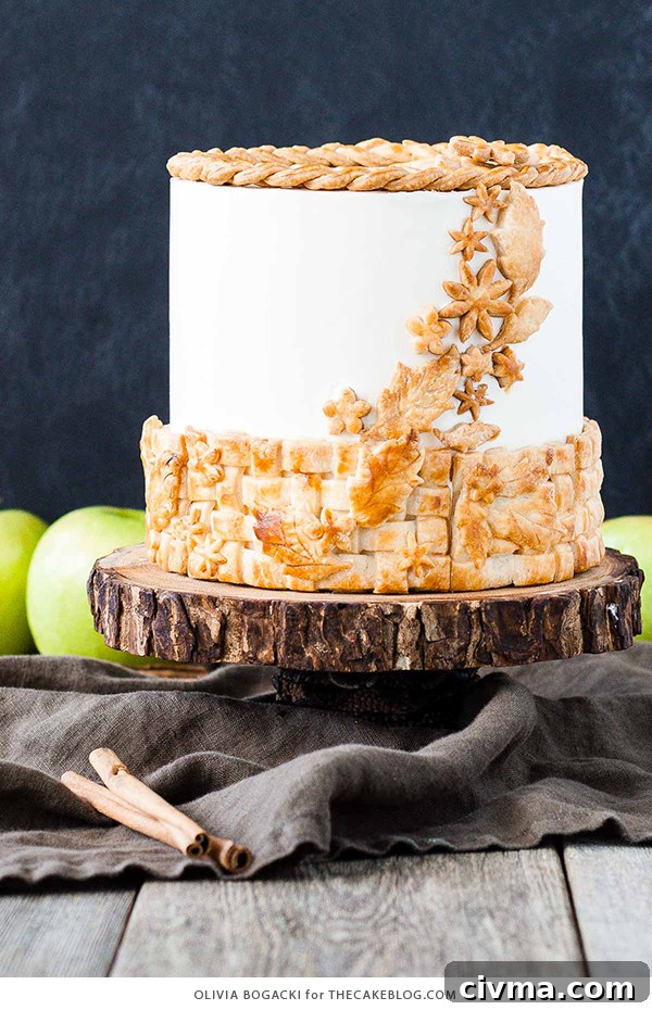 Apple Pie Cake with cinnamon, nutmeg, fresh apple pie filling, buttercream frosting, and braided pie crust lattice