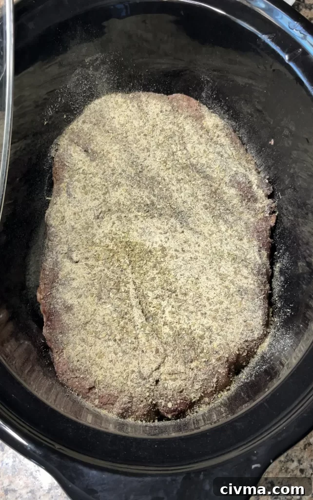 Seasoned beef roast in the crockpot