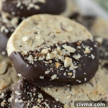 Nutella Stuffed Cookies Recipe 8 Hazelnut cookies stacked on top of each other.