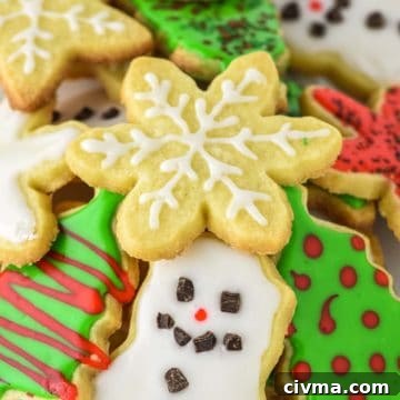 Nutella Stuffed Cookies Recipe 10 sugar cookies stacked on top of each other on white board