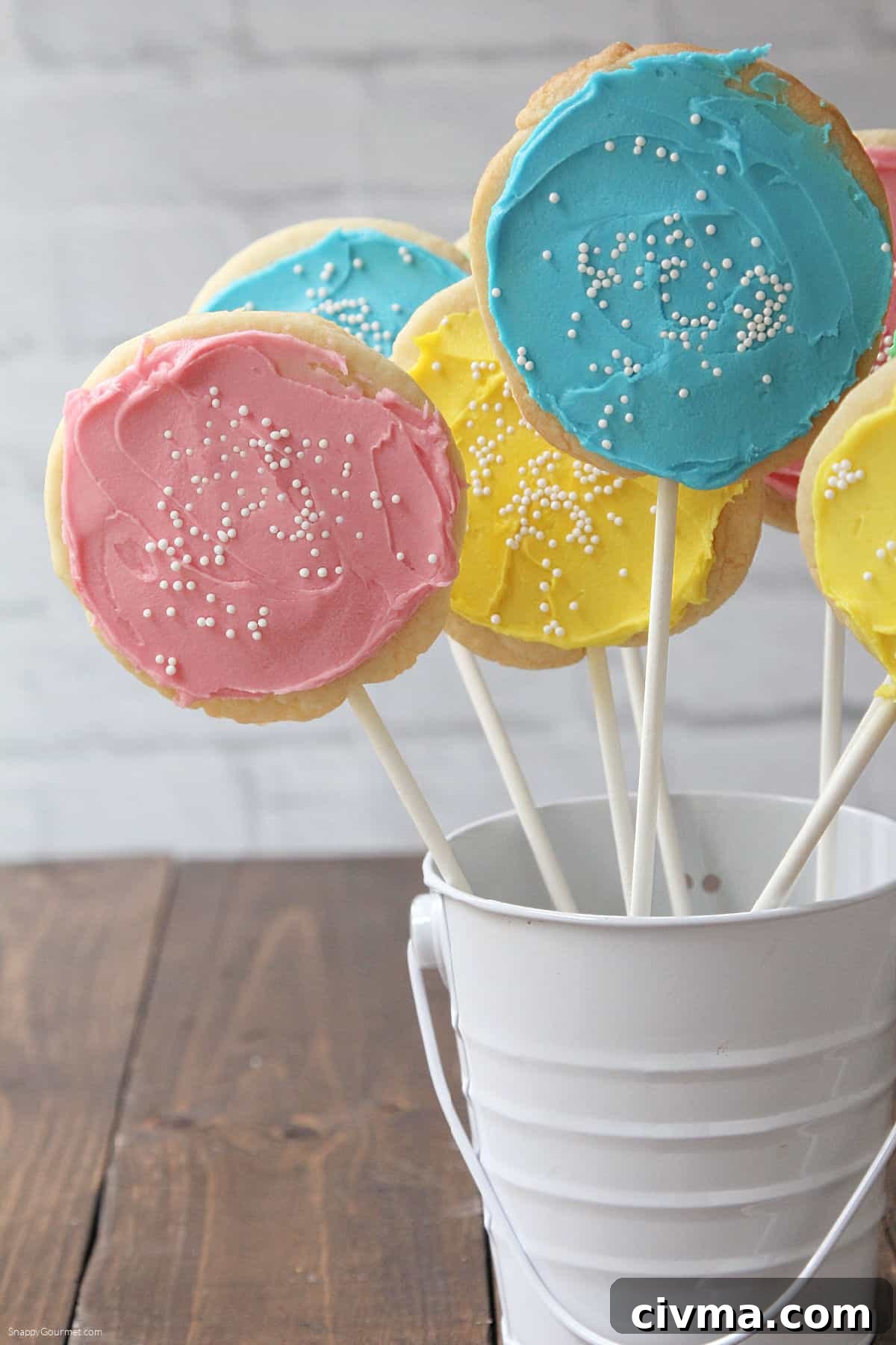 multiple homemade Cookie Pops standing in container