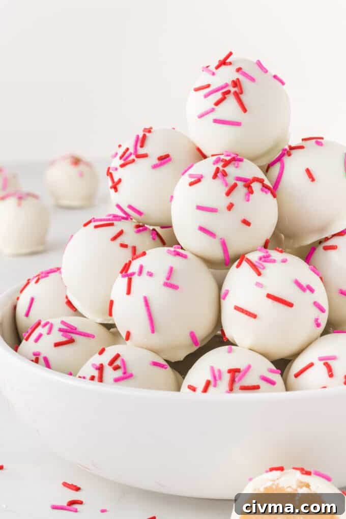 bowl of sugar cookie Valentine truffles with red and pink sprinkles