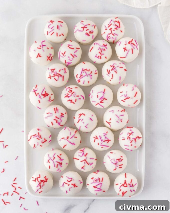 tray of sugar cookie Valentine truffles with red and pink sprinkles