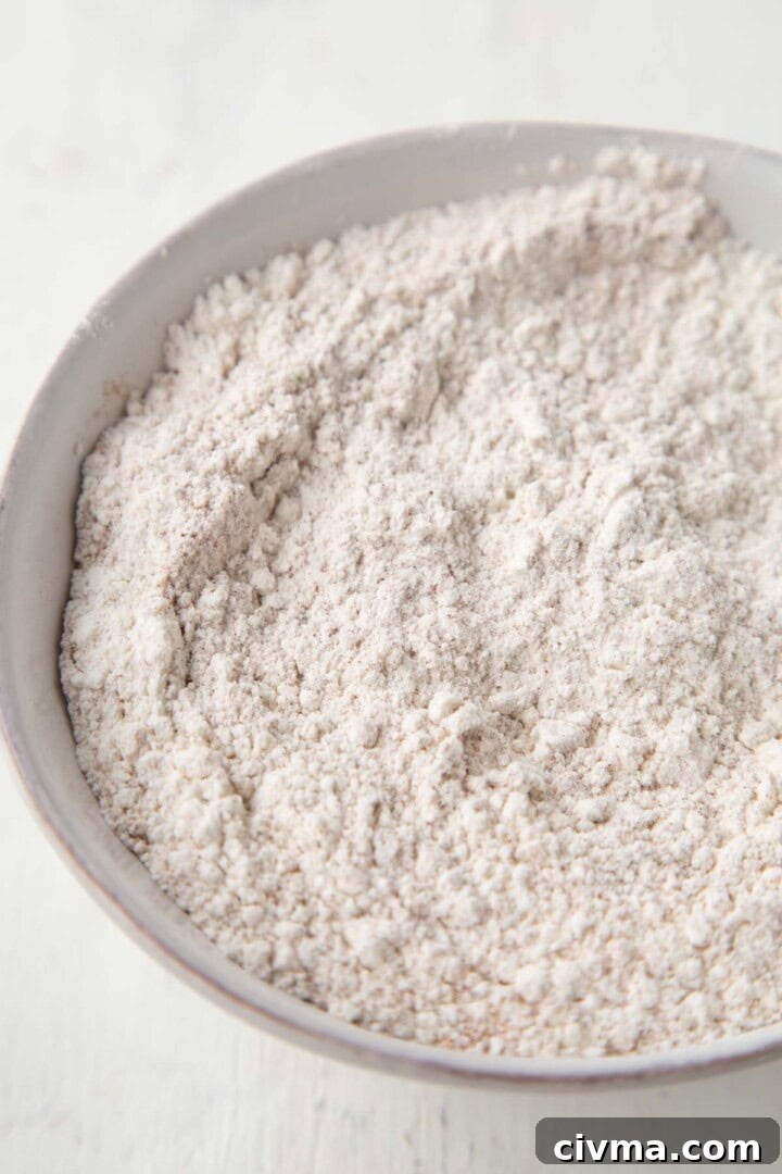 flour and cinnamon mixture in a metal bowl.