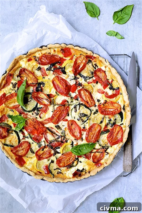 Photo of whole Provencal Vegetable and Goat Cheese Tart on cooling rack.