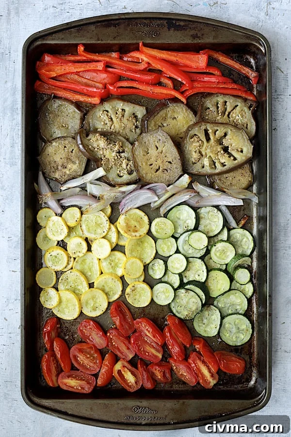 Photo of roasted vegetables on baking sheet.