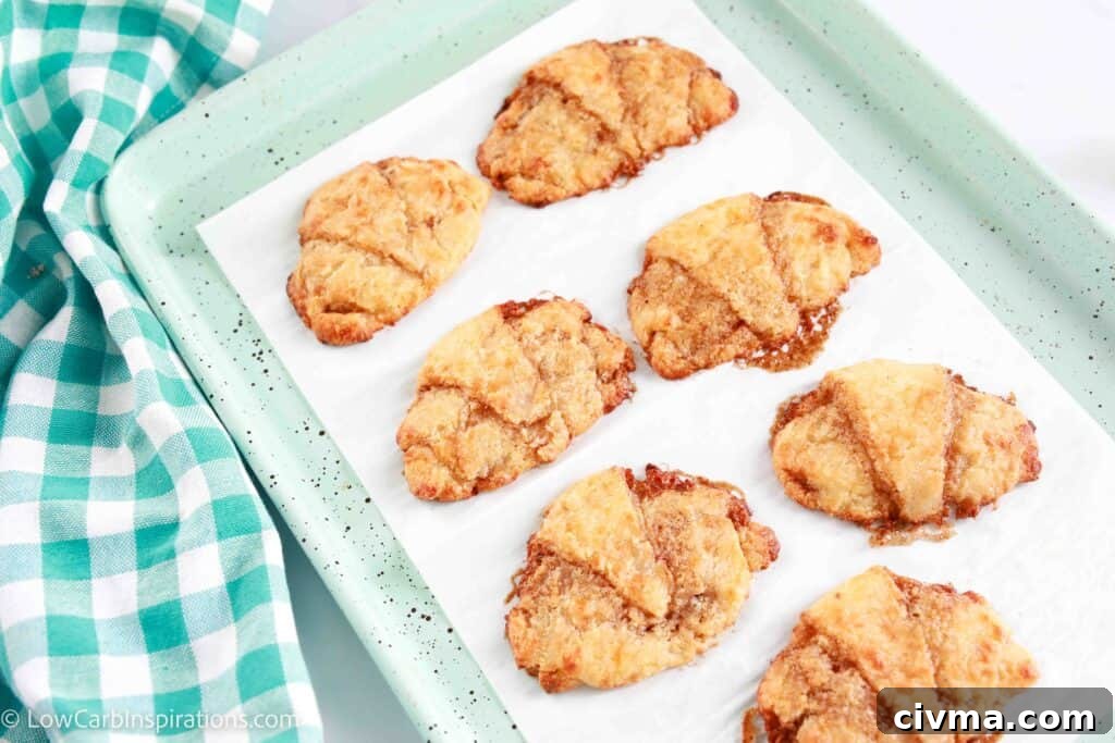Drizzling icing over cinnamon croissants