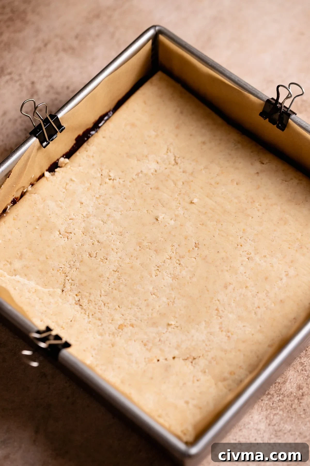Soft Gooey Smores Cookie Bars Recipe 8 Unbaked smores bars in a metal baking pan.