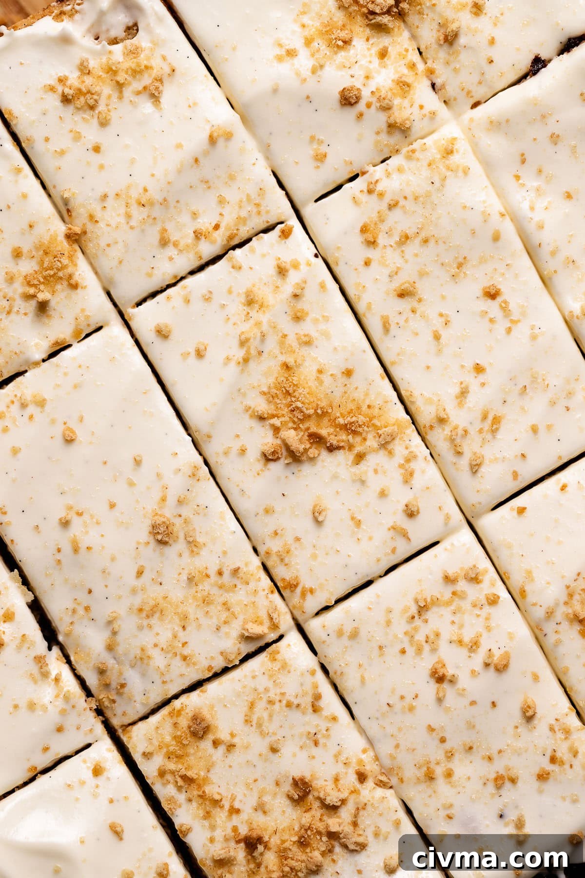 Soft Gooey Smores Cookie Bars Recipe 10 Smores cookie bars with marshmallow frosting cut into squares and sprinkled with graham cracker crumbs.