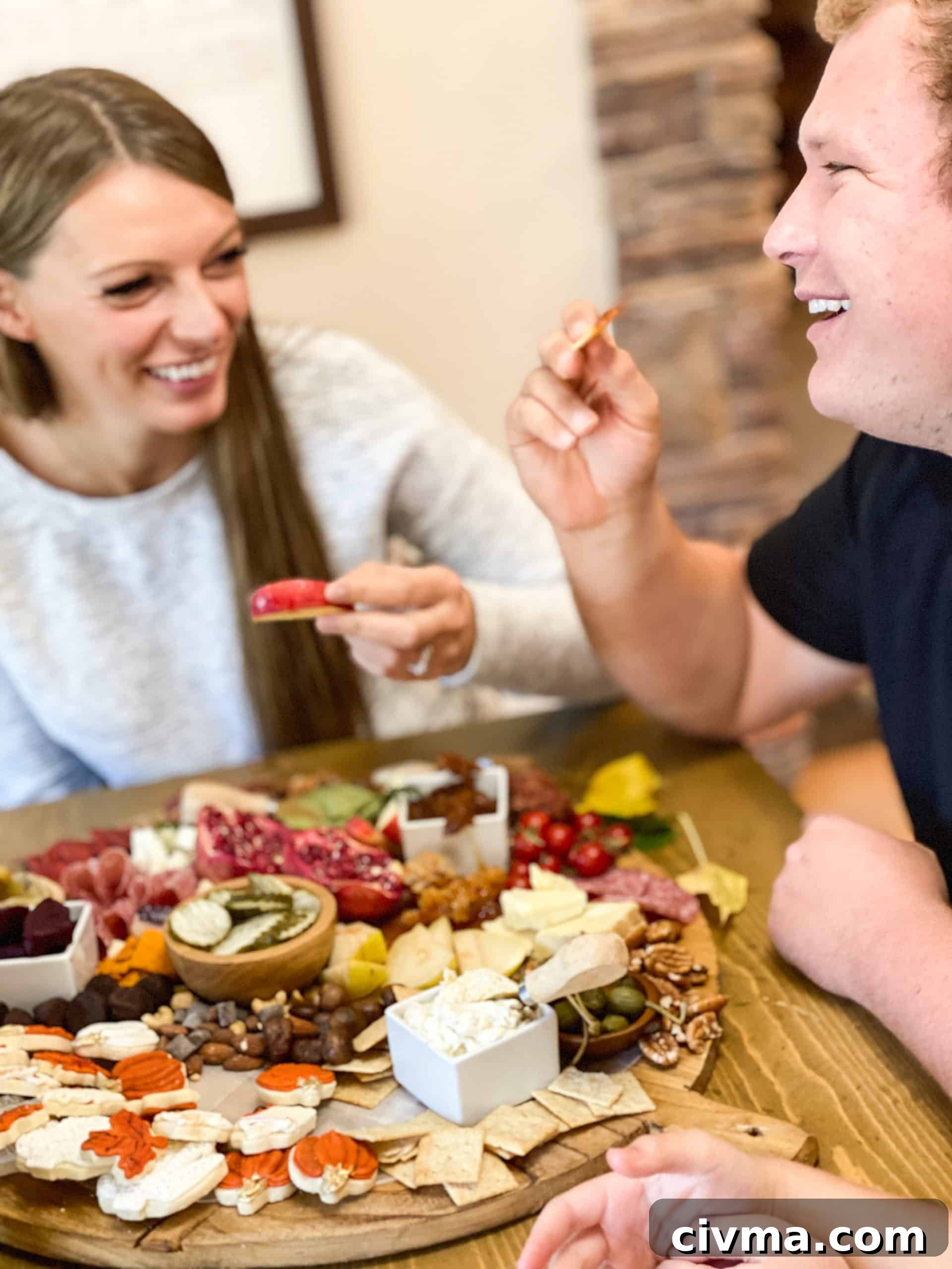 Create a Stunning Thanksgiving Charcuterie Board 4 Thanksgiving Charcuterie Board with people eating