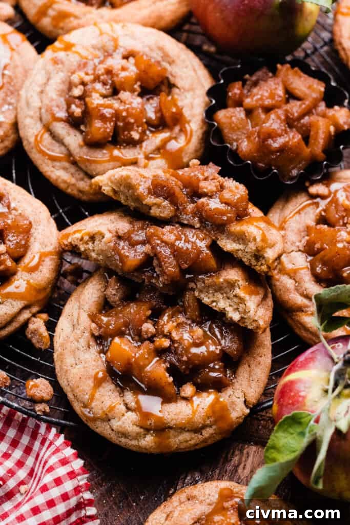 Salted Caramel Apple Pie Cookie Recipe 12 An apple pie cookie broken into two halves.