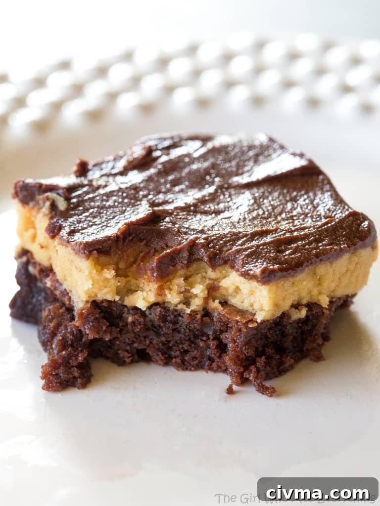 Fudgy Buckeye Brownies with Peanut Butter Filling 5 Peanut Butter Truffle Brownies with a bite out of it