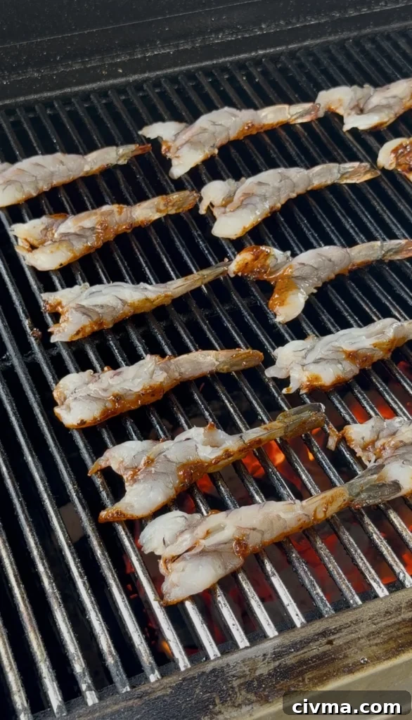 Guajillo Ancho Orange Chili Shrimp Recipe 8 adding shrimp to the grill