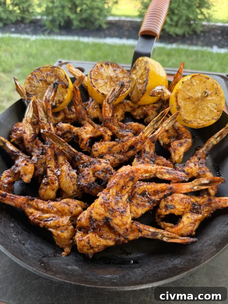 Guajillo Ancho Orange Chili Shrimp Recipe 10 plate of grilled shrimp on a black plate