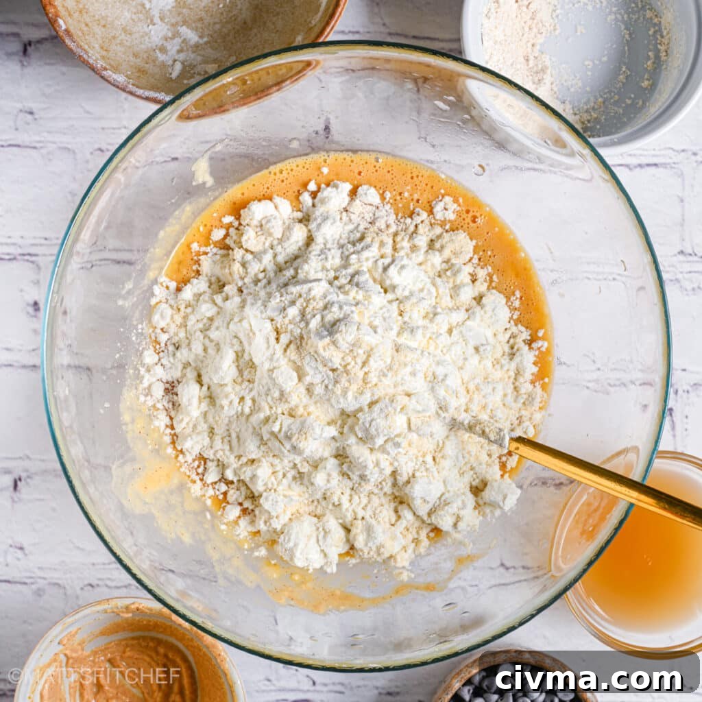 Sugar Free Banana Bread Recipe 5 Adding protein powder and flours to wet ingredients