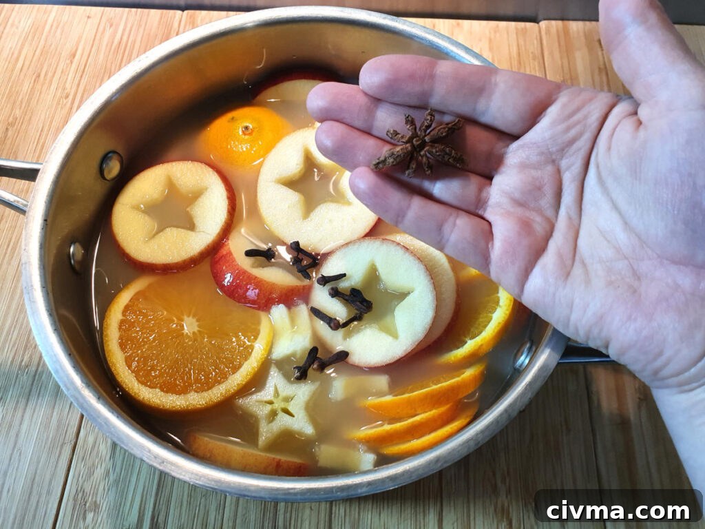 Adding star anise to pot.