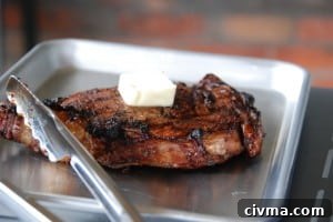 steak resting with butter on top.