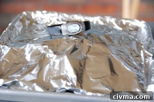 meat resting covered with foil.