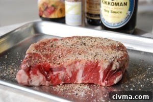 ribeye steak seasoned.