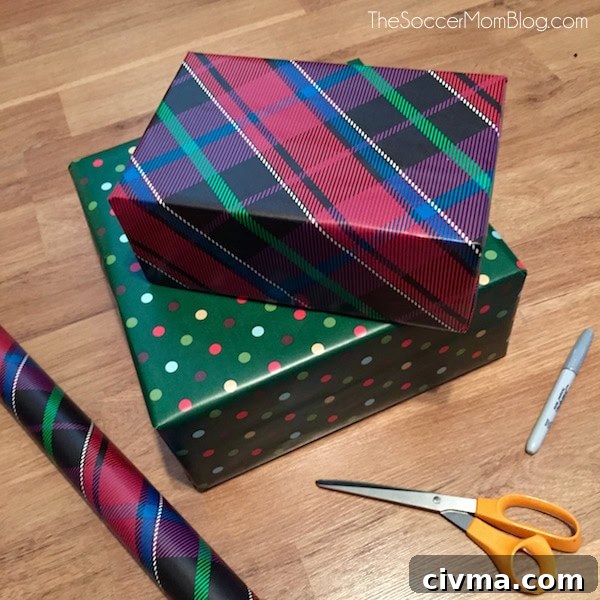 Wrapped gifts decorated with metallic marker 'ribbons' and designs
