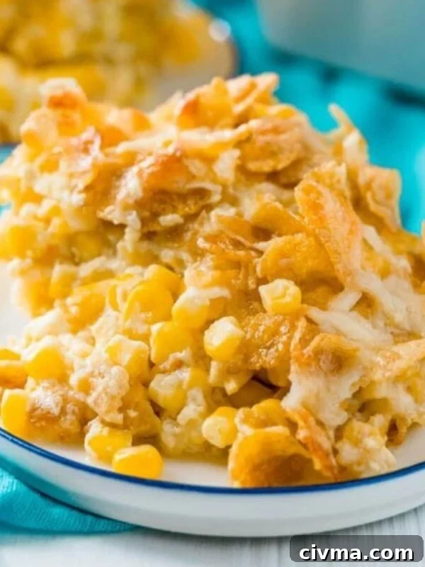 baked scalloped corn with crispy cornflakes on a plate on a table