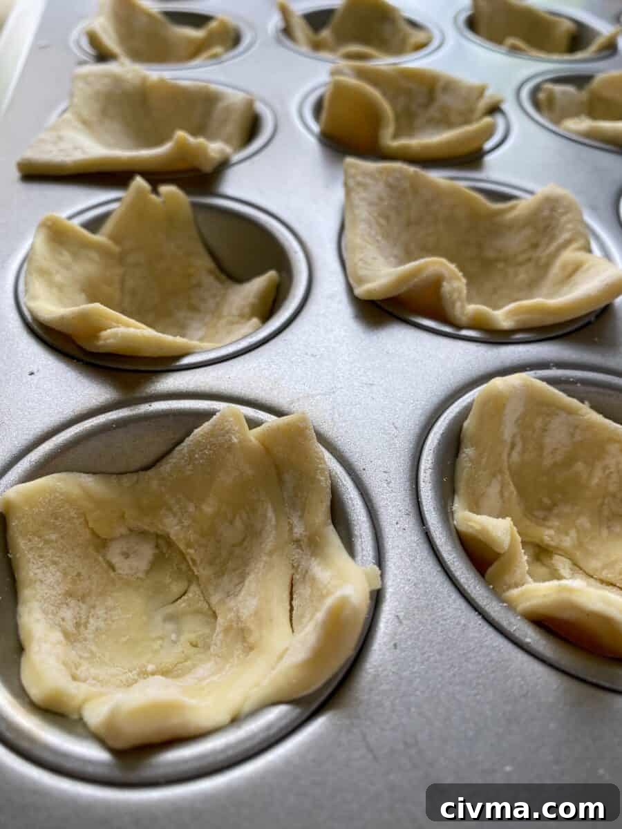 Philly Cheesesteak Bites Recipe 6 Puffed pastry dough, raw, placed into mini-muffin cups.