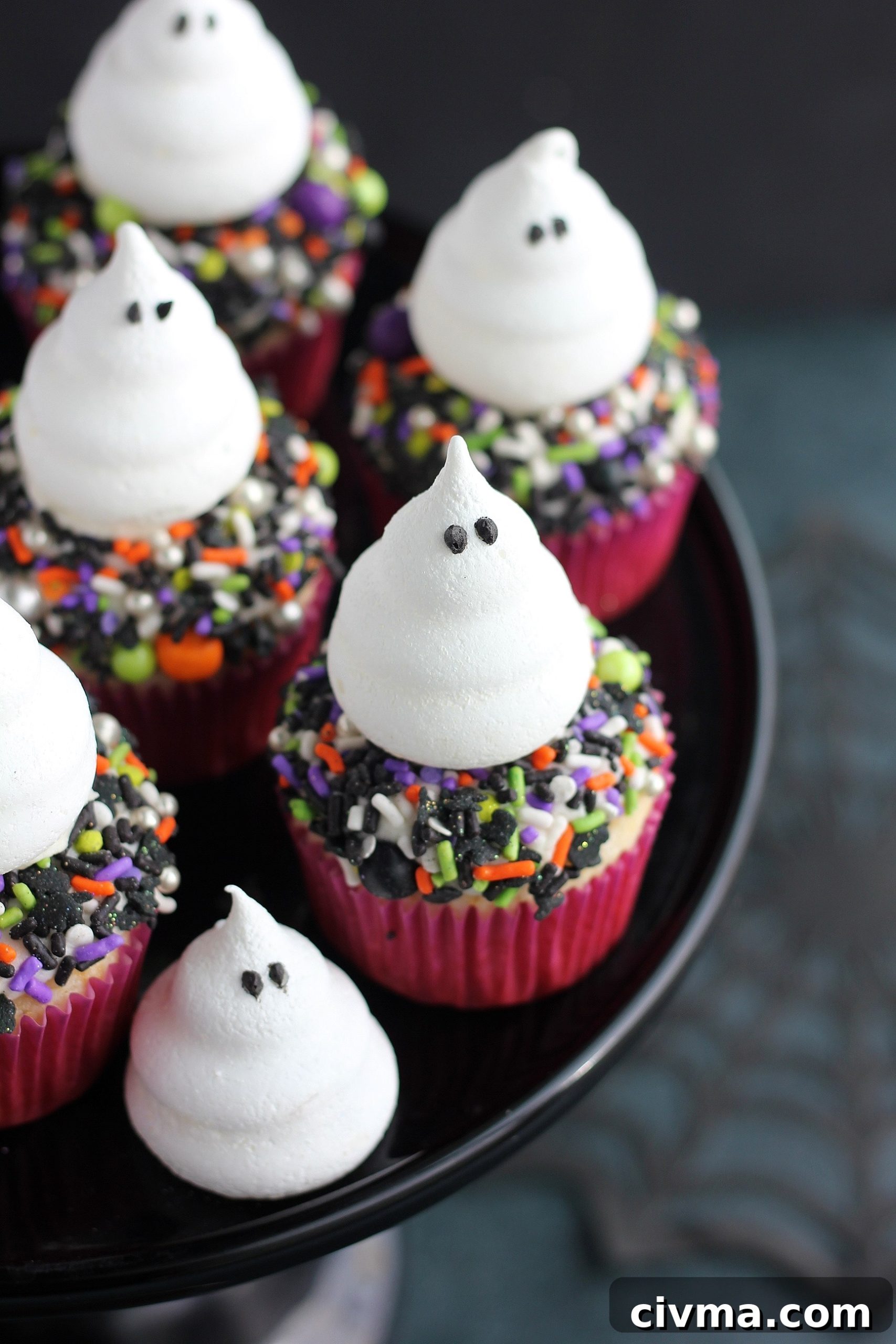 Halloween Ghost Meringue Cupcakes Recipe 2 Ghost meringues on a plate