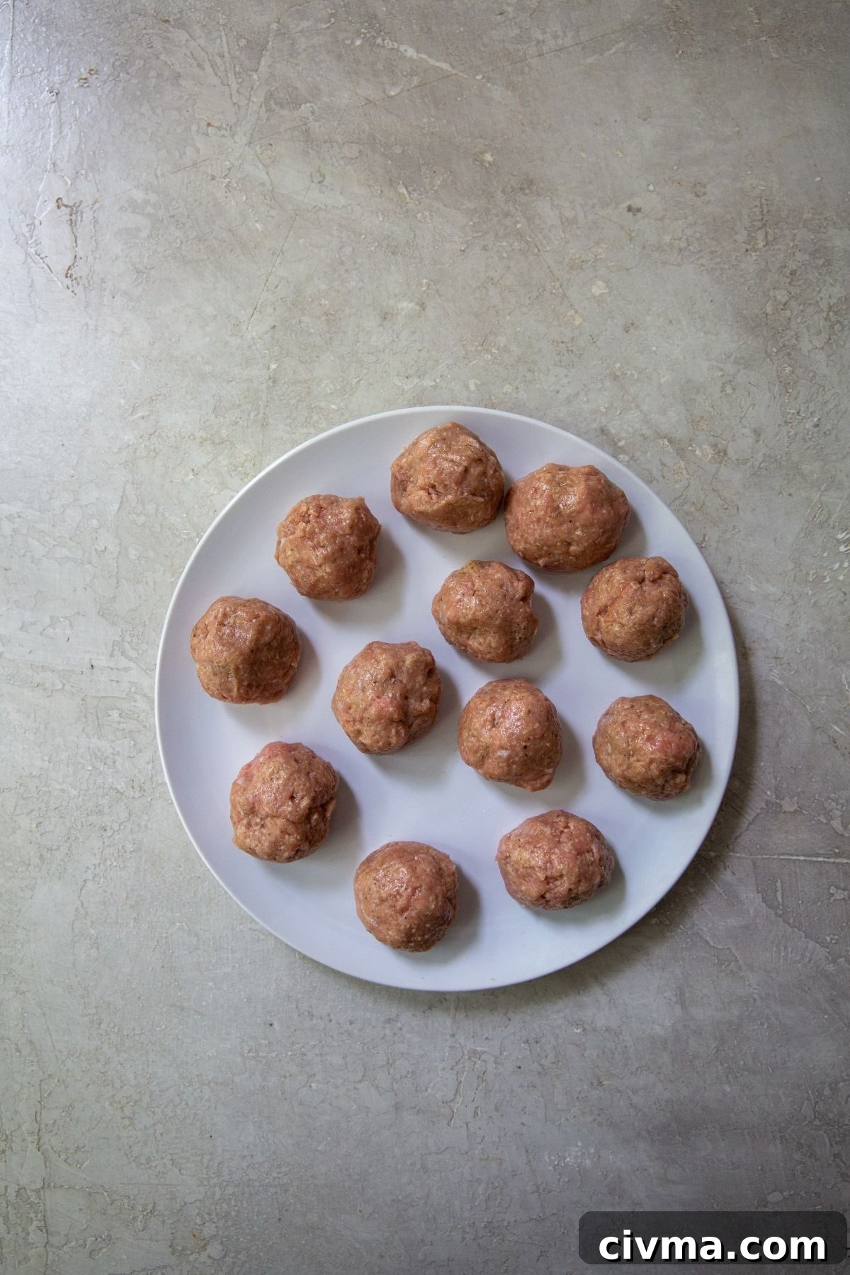 cooked meatballs on a white plate