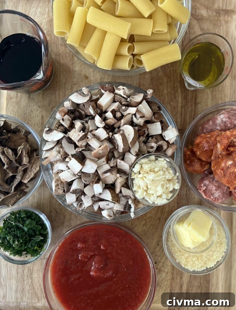 Rigatoni Boscaiola Recipe: Creamy Mushrooms and Sausage 5 Prepped ingredients for rigatoni boscaiola.
