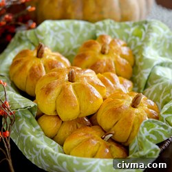 These Pumpkin Dinner Rolls make a great presentation for Thanksgiving feast.