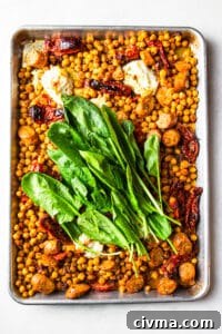 Fresh spinach folded into roasted sausage and chickpeas