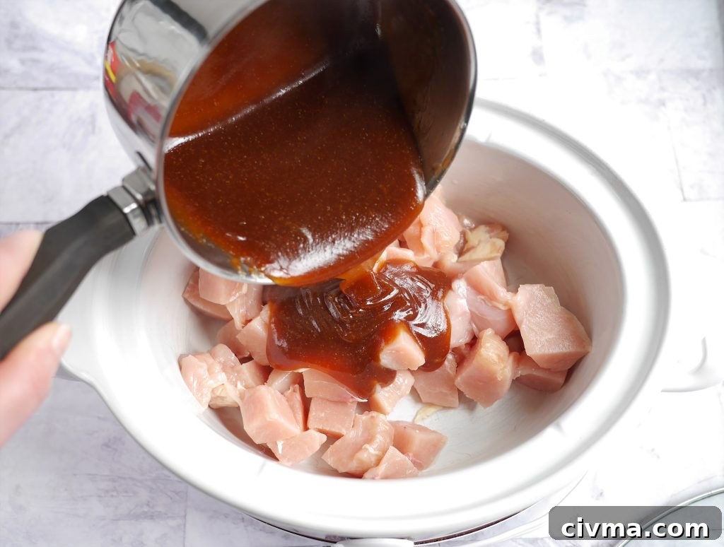 Slow cooker sweet and sour chicken ready to serve