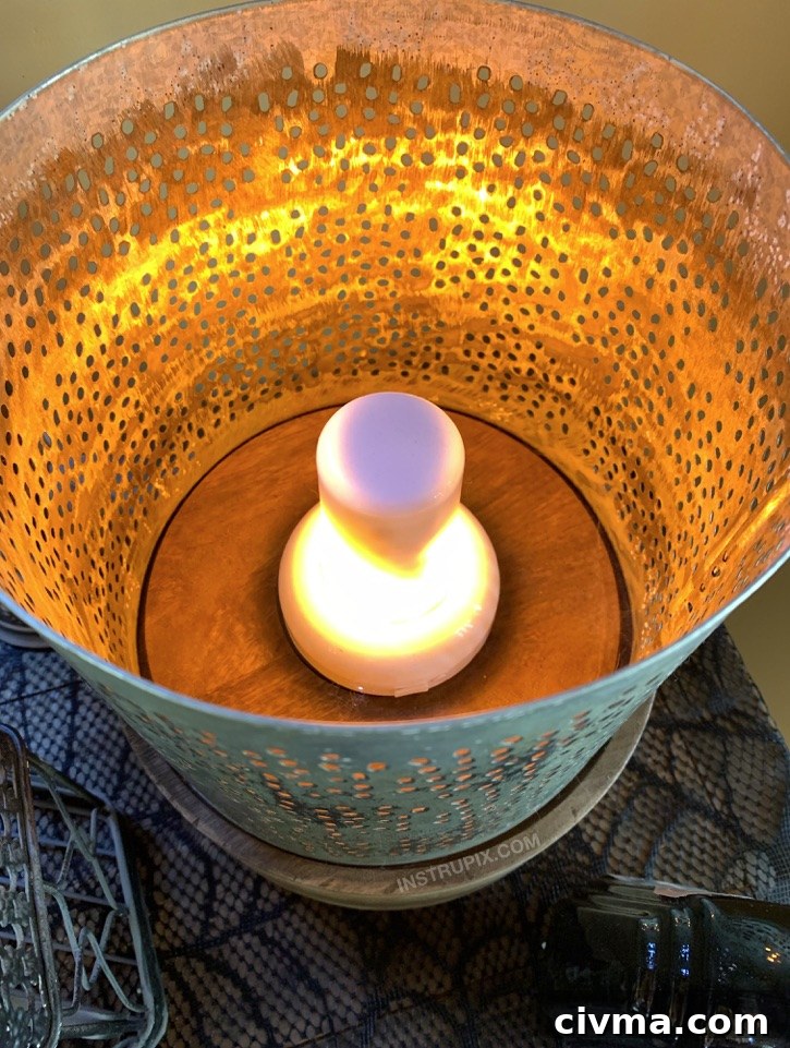 LED flame light used in a metal candle holder for Halloween decor