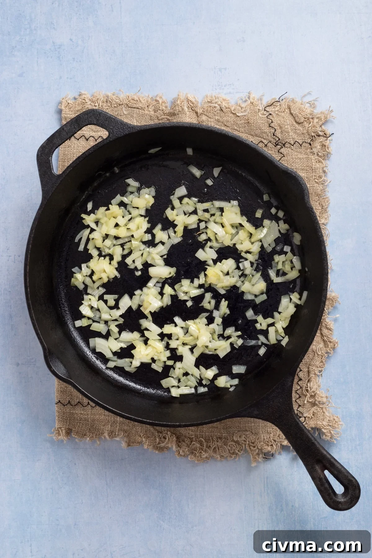 An image of sauteing the onions.