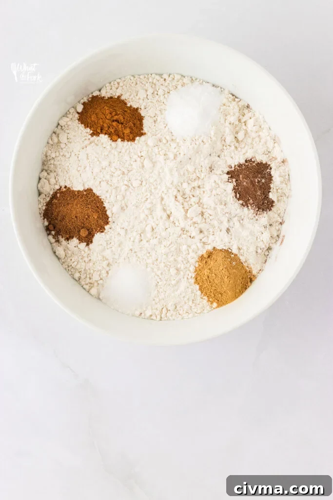 dry ingredients in a white bowl to make gluten free ginger cookies