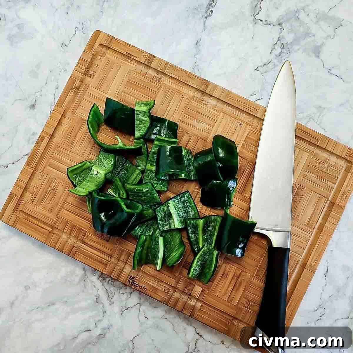 Green Spaghetti with Creamy Poblano Sauce 5 Overhead view of process shot 2 - cut and trim the peppers.