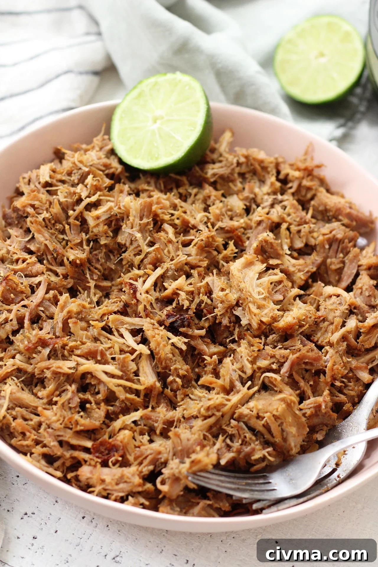 Tender shredded Paleo Instant Pot carnitas for Whole30 meal prep