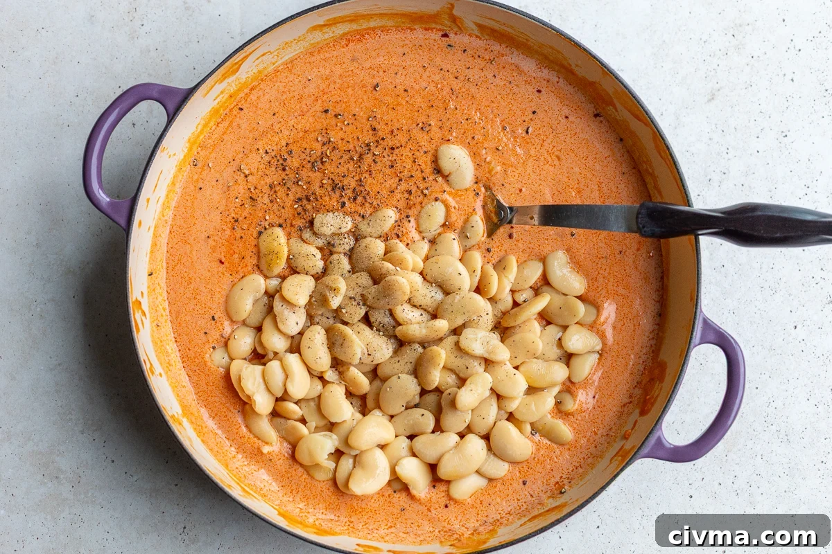 butter beans added to creamy tomato vodka sauce