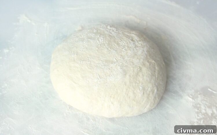 No Knead Crusty Bread Recipe with Video 7 dough formed into a ball