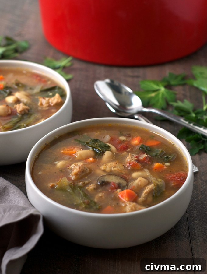 Chicken Sausage Escarole and White Bean Soup in a bowl